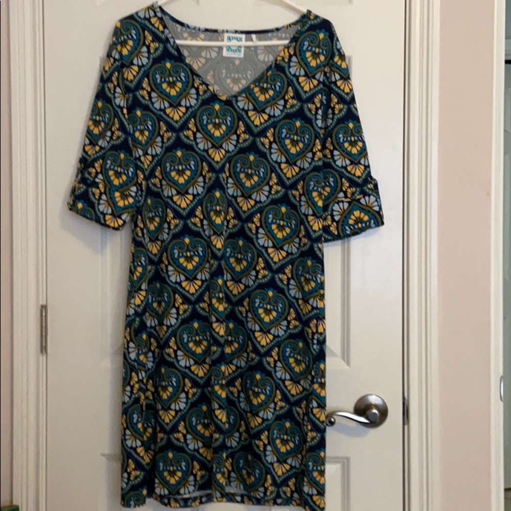 Beautiful dress. Perfect for the office, a shower